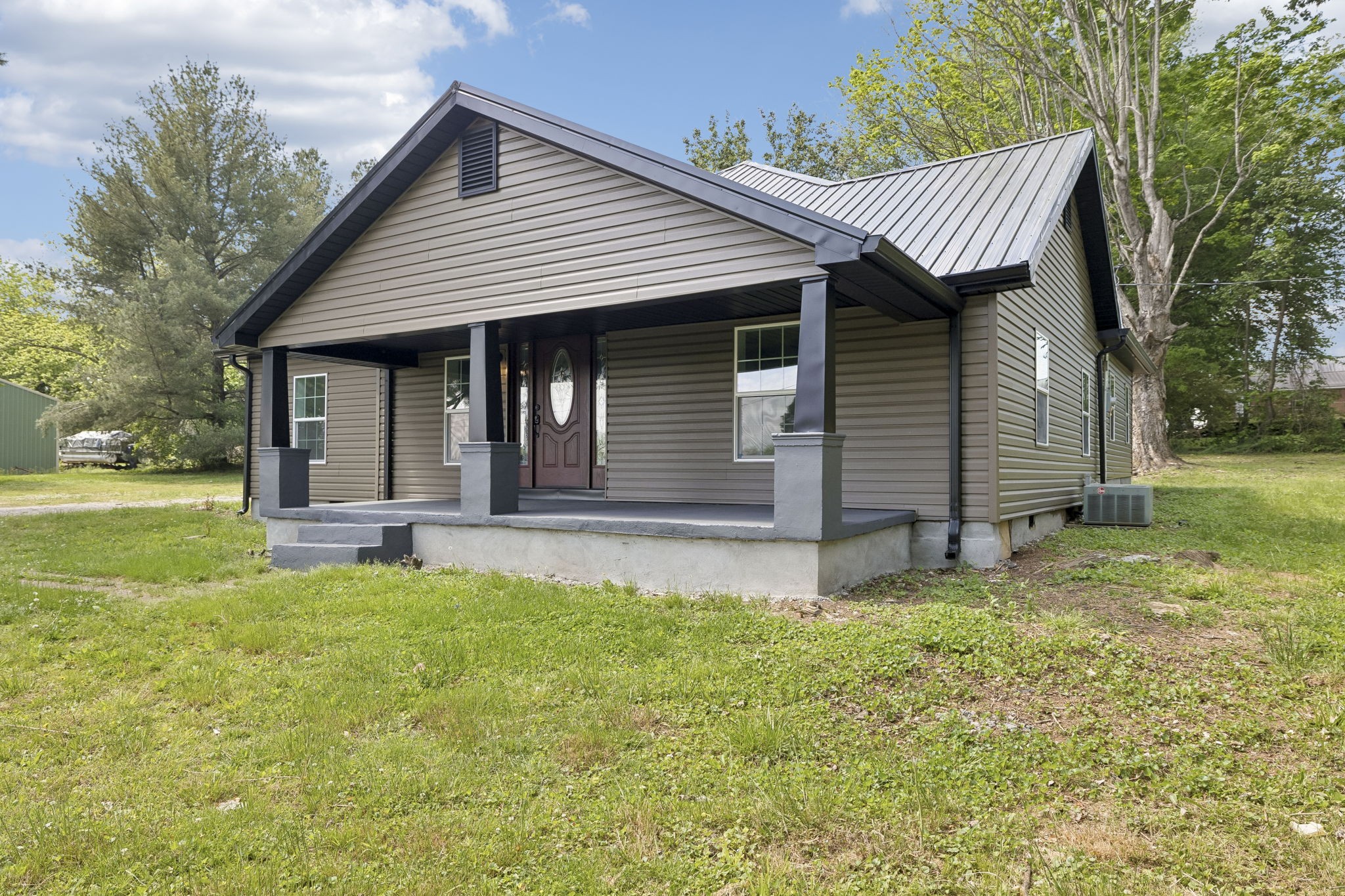 1200 Little Street Winchester, TN 37398 - Photo 3 of 54 a front view of a house with a yard