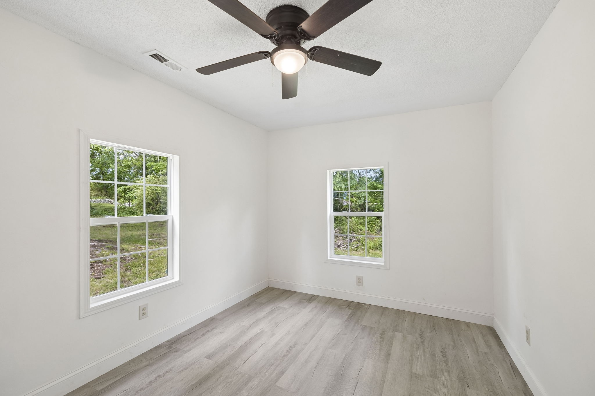 1200 Little Street Winchester, TN 37398 - Photo 33 of 54 an empty room with a window and a fan