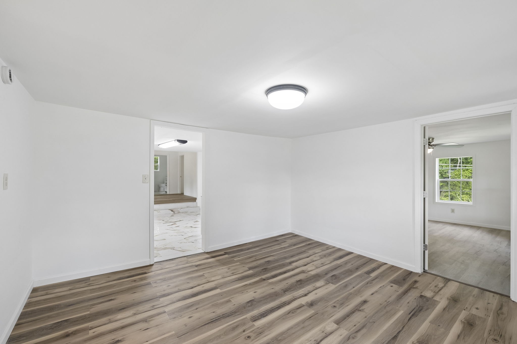 1200 Little Street Winchester, TN 37398 - Photo 9 of 54 a view of empty room with wooden floor and fan