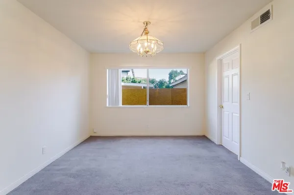 an empty room with window