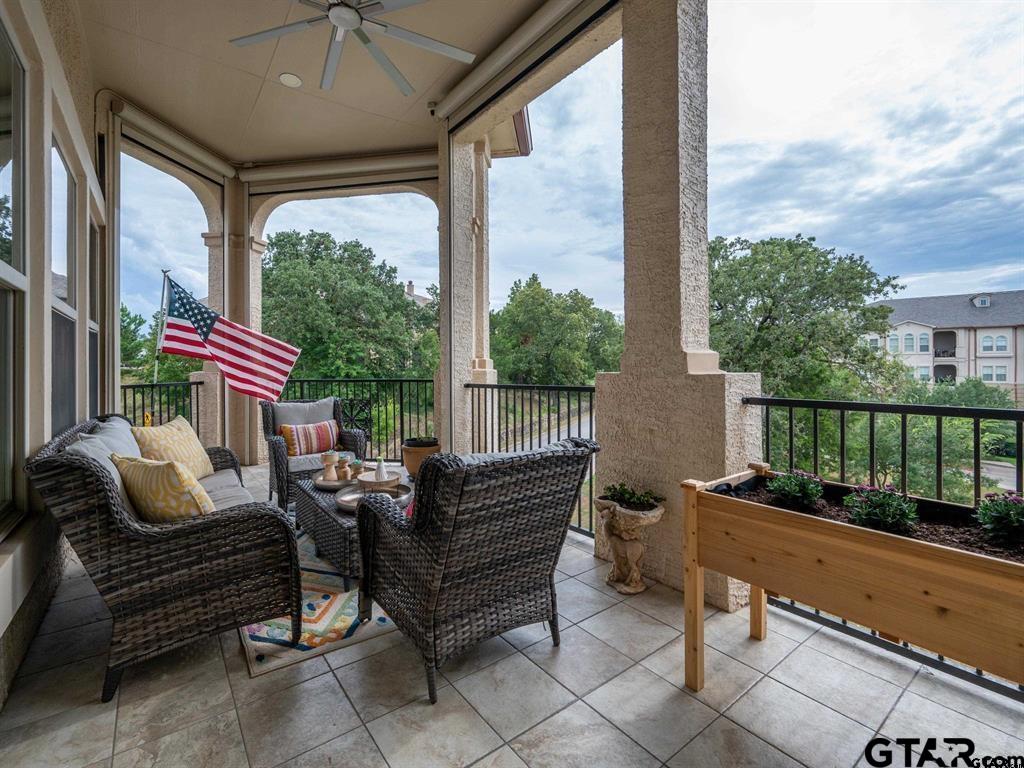 3351 Cascades Court, Unit 324 Tyler, TX 75709 - Photo 21 of 46 a outdoor living space with patio furniture and a potted plant