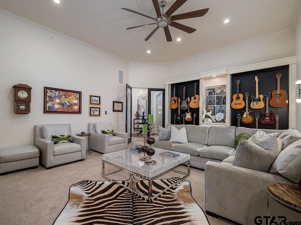 3351 Cascades Court, Unit 324 Tyler, TX 75709 - Photo 28 of 46 a living room with furniture and a ceiling fan