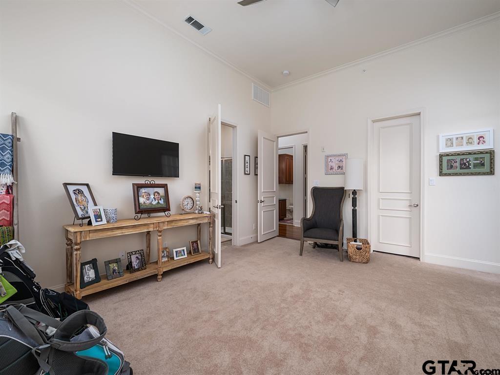 3351 Cascades Court, Unit 324 Tyler, TX 75709 - Photo 41 of 46 a view of a livingroom with furniture and a flat screen tv