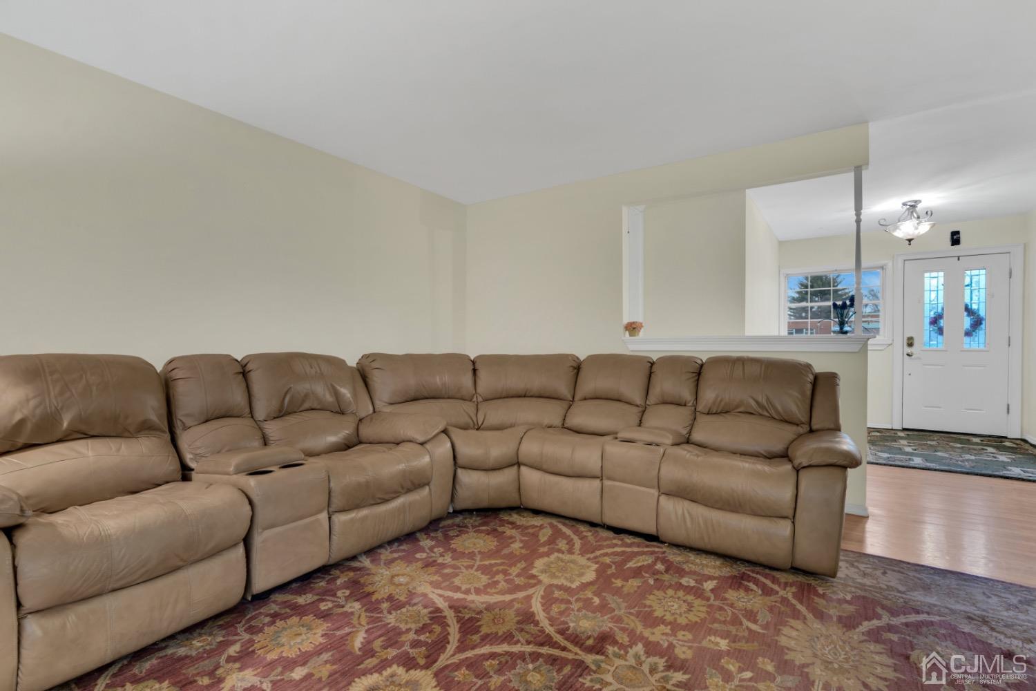 17 Temple Road, Unit 17 Old Bridge, NJ 08859 - Photo 12 of 40 a living room with furniture and a couch