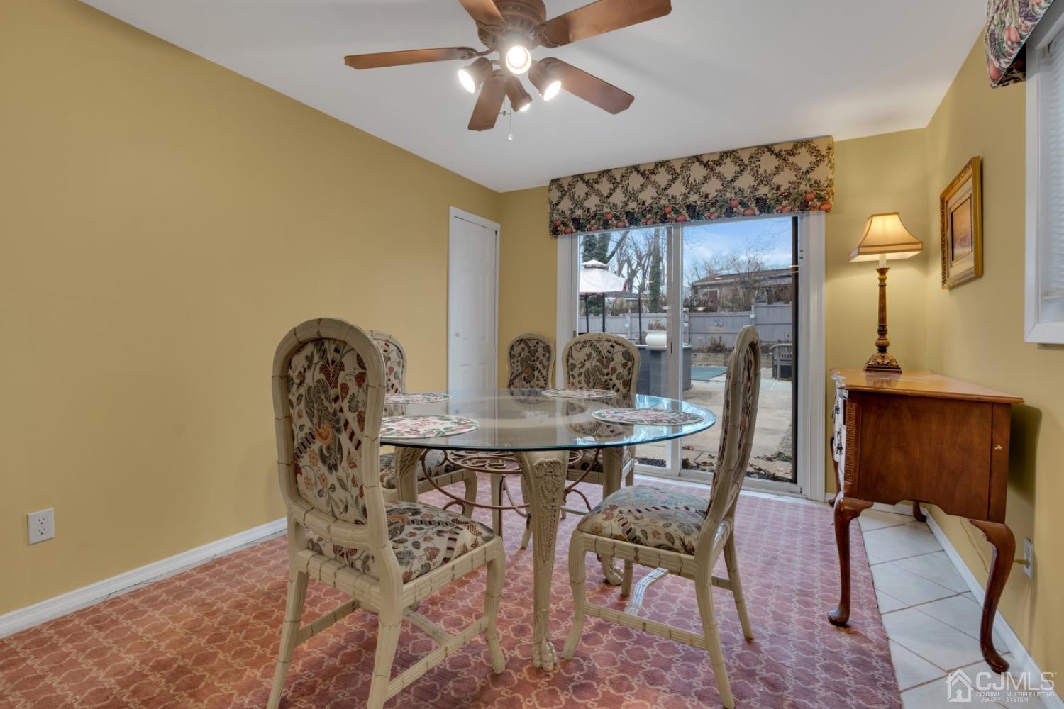 17 Temple Road, Unit 17 Old Bridge, NJ 08859 - Photo 14 of 40 a view of a dining room with furniture and chandelier