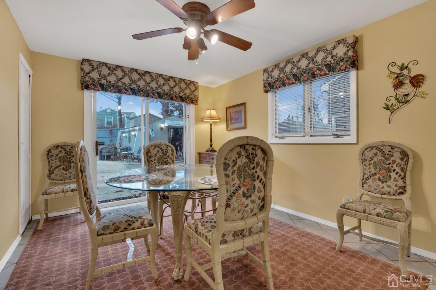 17 Temple Road, Unit 17 Old Bridge, NJ 08859 - Photo 15 of 40 a view of a dining room with furniture and chandelier