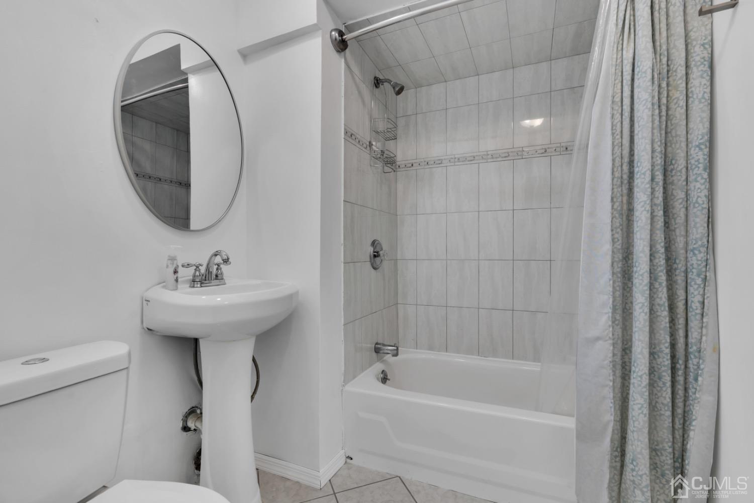 17 Temple Road, Unit 17 Old Bridge, NJ 08859 - Photo 29 of 40 a bathroom with a sink toilet and shower