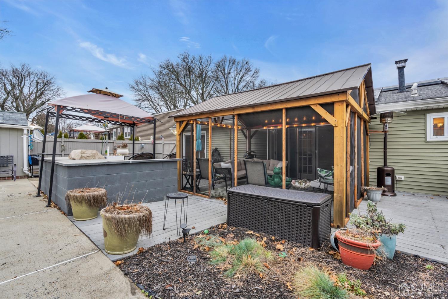 17 Temple Road, Unit 17 Old Bridge, NJ 08859 - Photo 40 of 40 a building outdoor space with patio furniture and potted plants