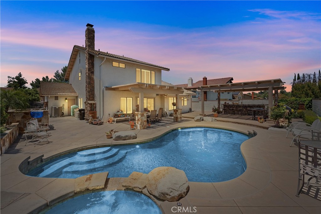 3542 Hawkwood Road Diamond Bar, CA 91765 - Photo 1 of 1 a swimming pool with outdoor seating and yard