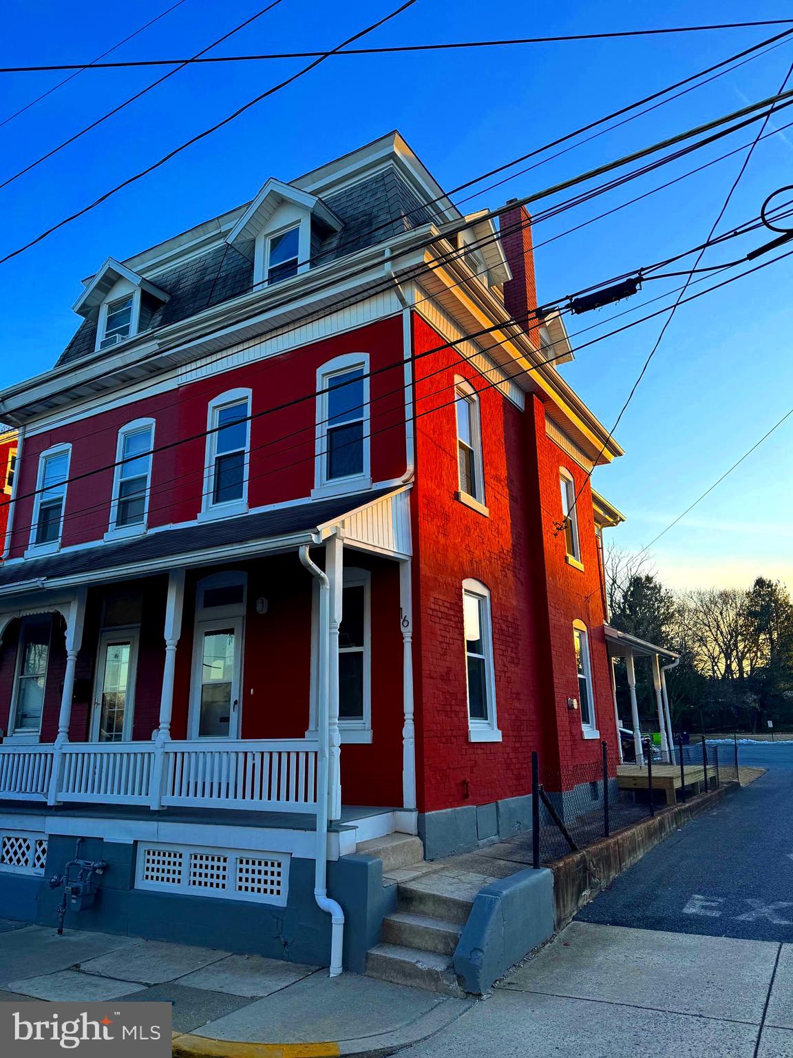 a view of a building with a street