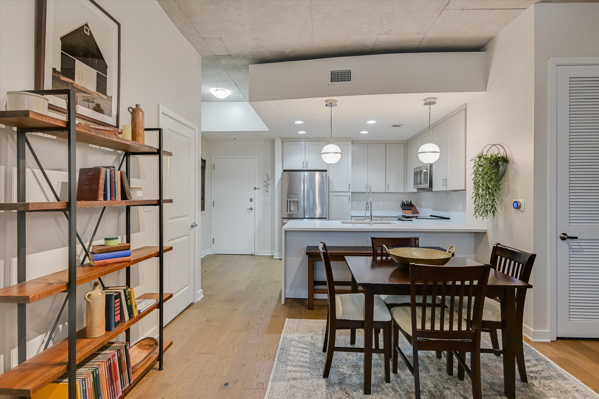 360 Nueces Street, Unit 1405 Austin, TX 78701 - Photo 10 of 40 a dining room with furniture and window