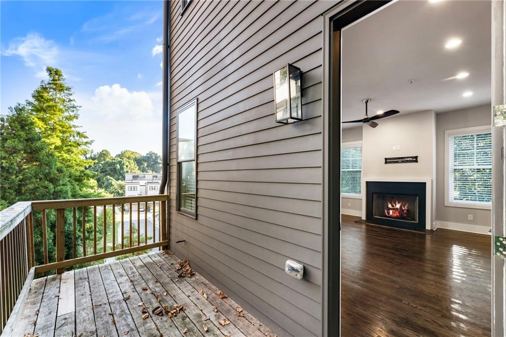 1819 Huntington Hills Lane Northwest Atlanta, GA 30309 - Photo 16 of 53 a view of a porch with wooden floor