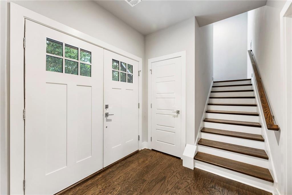 1819 Huntington Hills Lane Northwest Atlanta, GA 30309 - Photo 4 of 53 wooden floor in an empty room