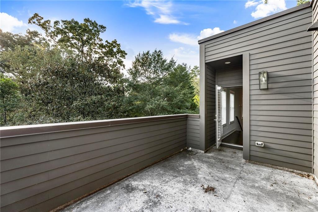 1819 Huntington Hills Lane Northwest Atlanta, GA 30309 - Photo 50 of 53 a view of outdoor space and deck