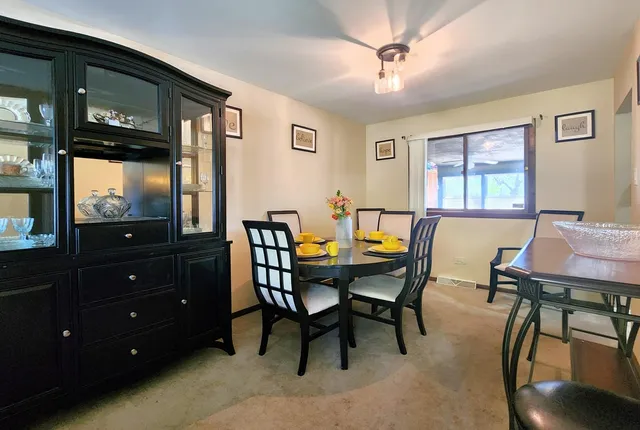 a view of a dining room with furniture
