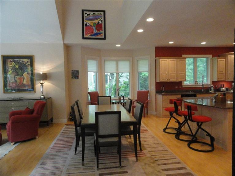 21 Greensward Road Mashpee, MA 02649 - Photo 4 of 22 a view of a a dining room with furniture window and wooden floor