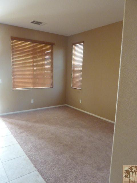 37185 Wakefield Street Indio, CA 92203 - Photo 6 of 8 an empty room with a window
