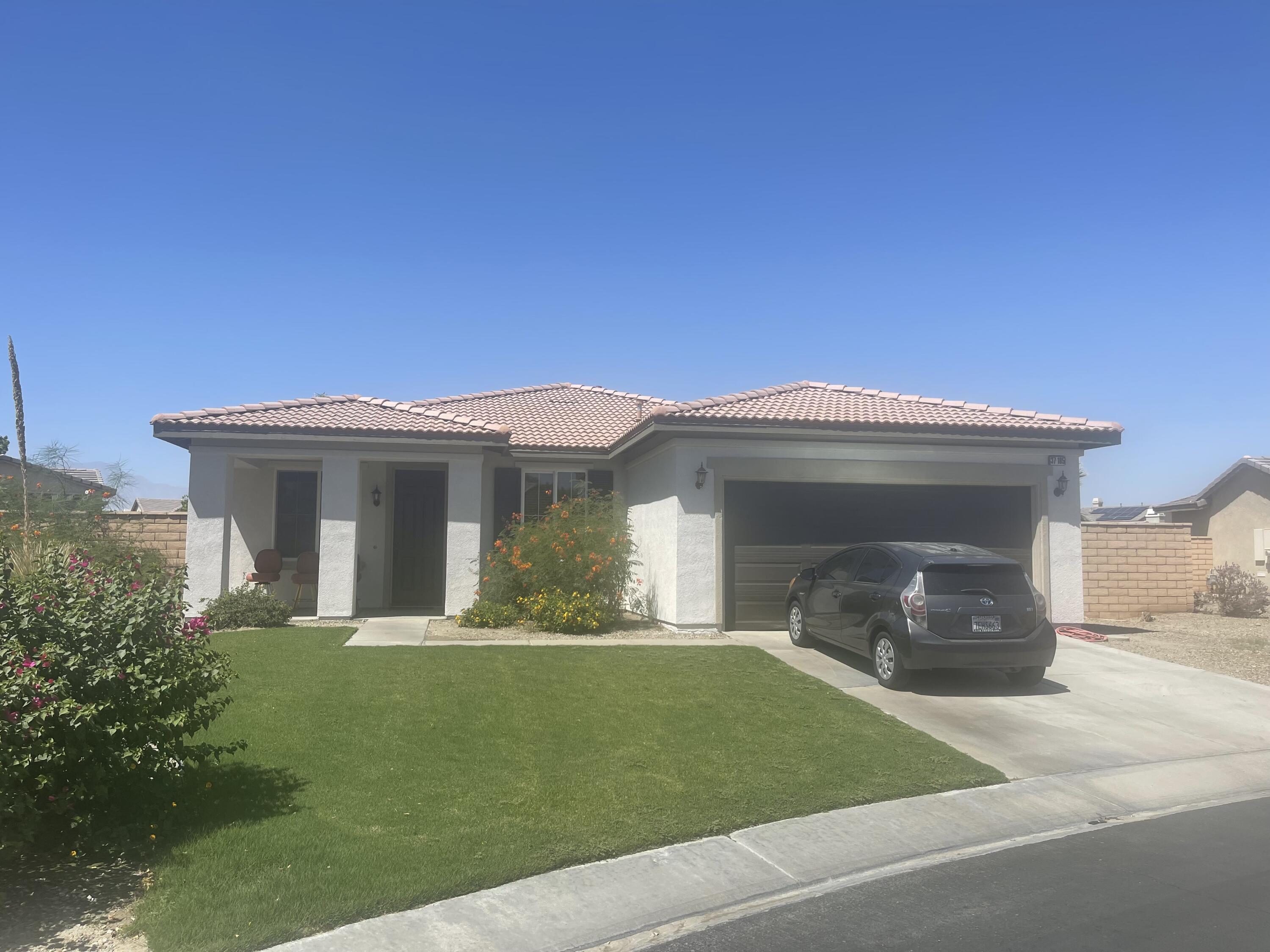 37185 Wakefield Street Indio, CA 92203 - Photo 8 of 8 a front view of a house with a yard
