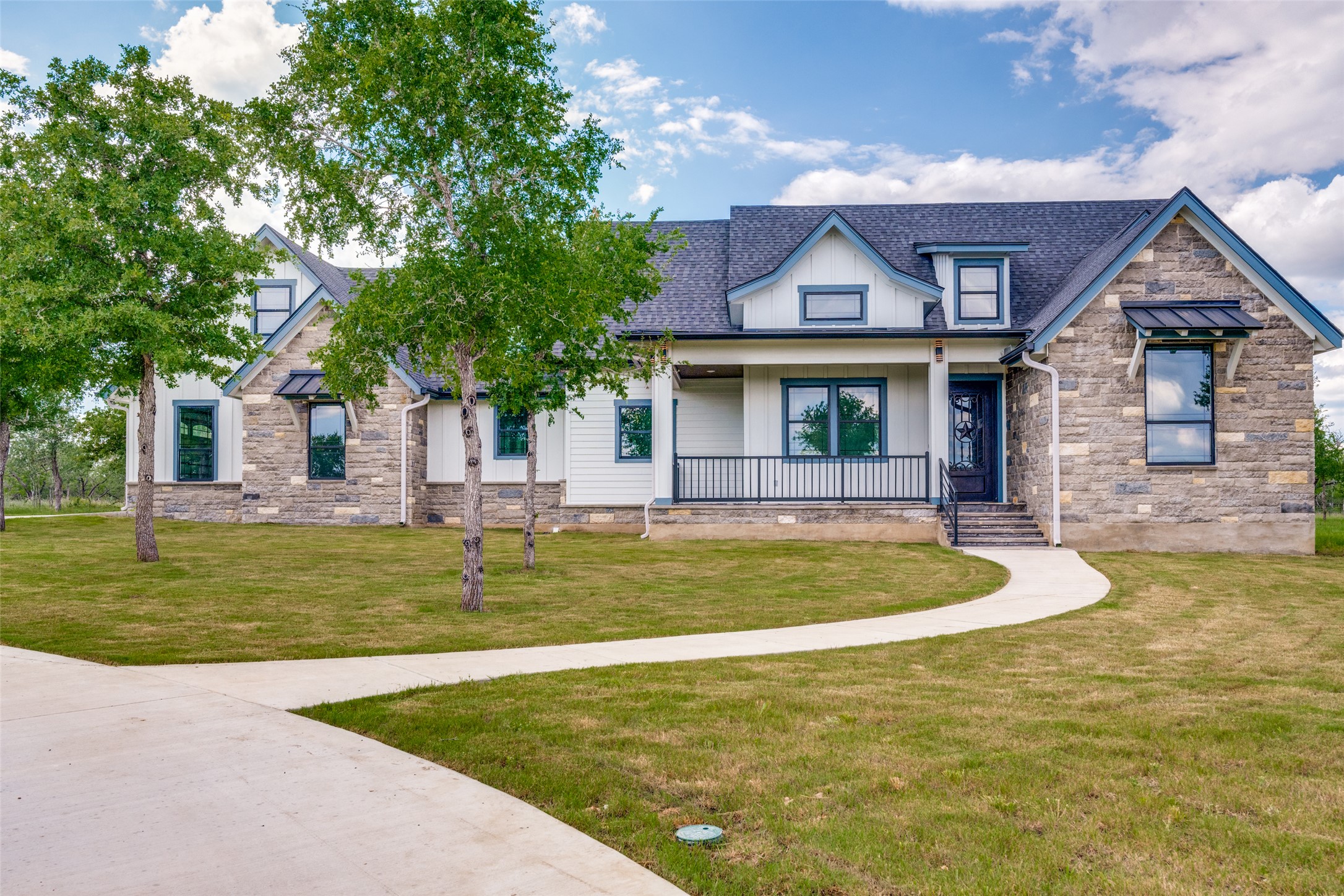 485 Post Oak Gonzales, TX 78629 - Photo 1 of 38 a front view of a house with a yard