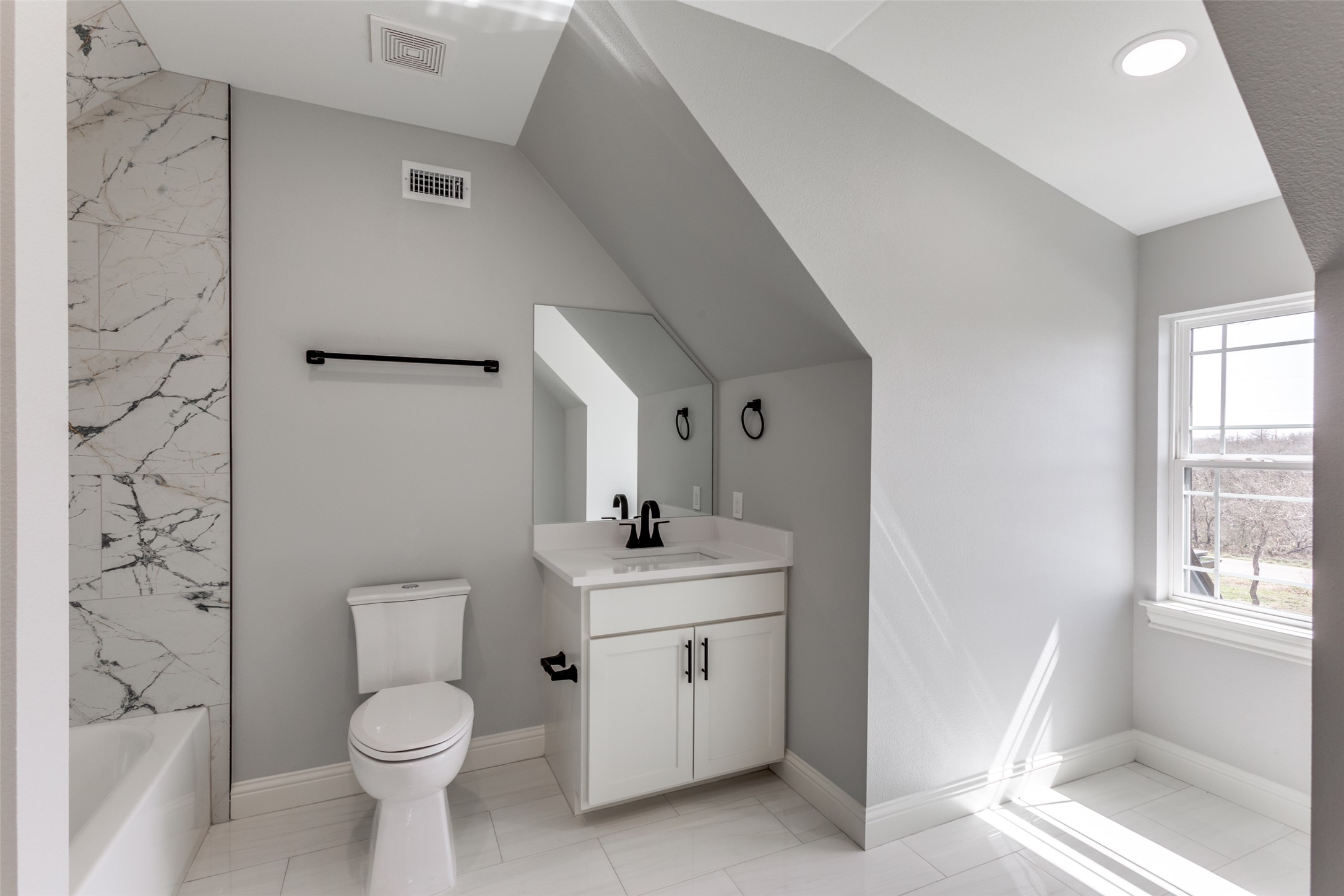 485 Post Oak Gonzales, TX 78629 - Photo 27 of 38 a bathroom with a toilet sink and a mirror