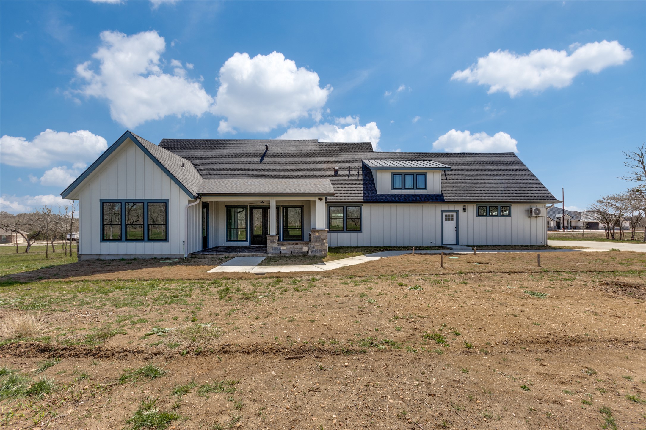 485 Post Oak Gonzales, TX 78629 - Photo 30 of 38 a front view of a house with garden