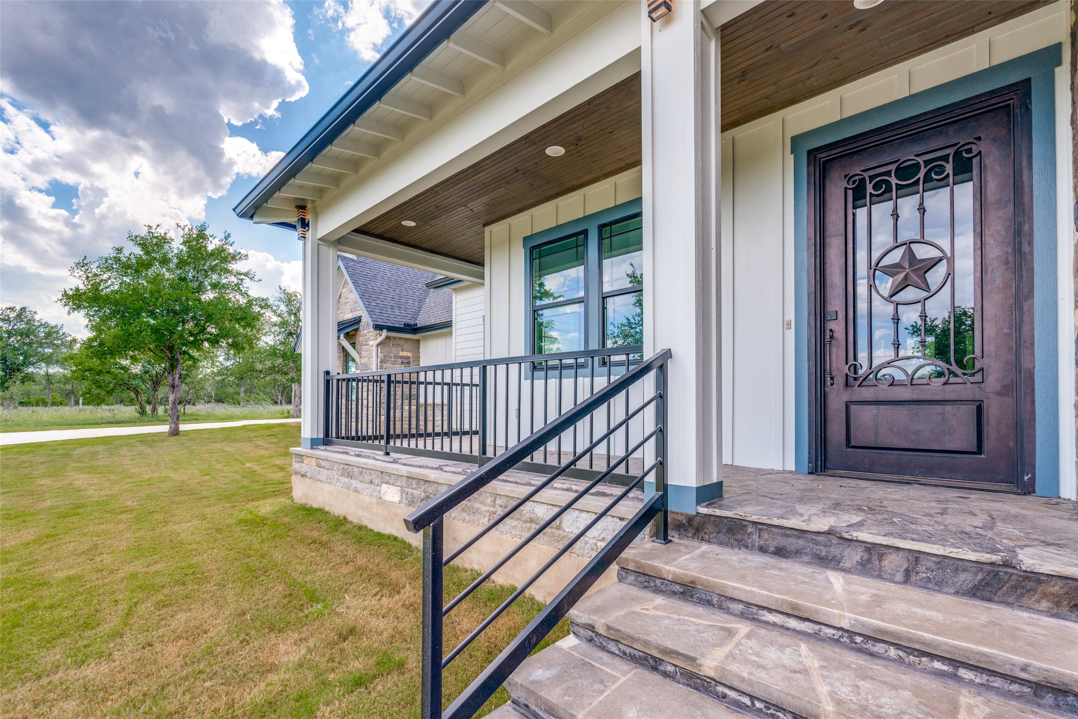 485 Post Oak Gonzales, TX 78629 - Photo 35 of 38 a view of a house with a small yard and flower plants