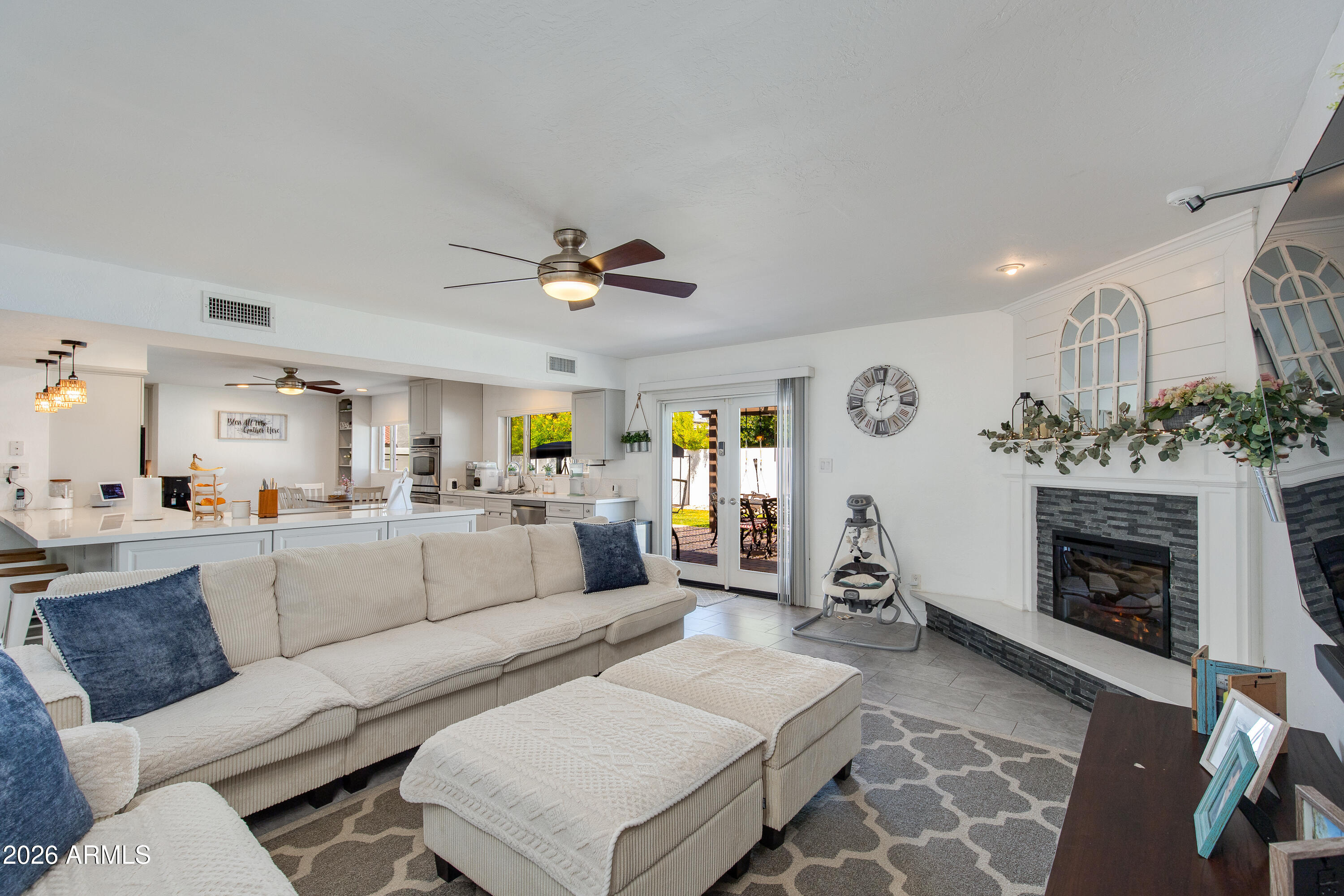 8219 North 3rd Avenue Phoenix, AZ 85021 - Photo 25 of 52 a living room with furniture and a fireplace