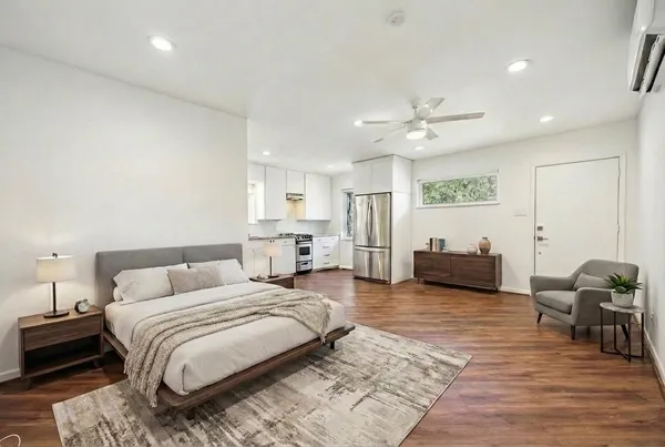 a workspace with furniture and a potted plant