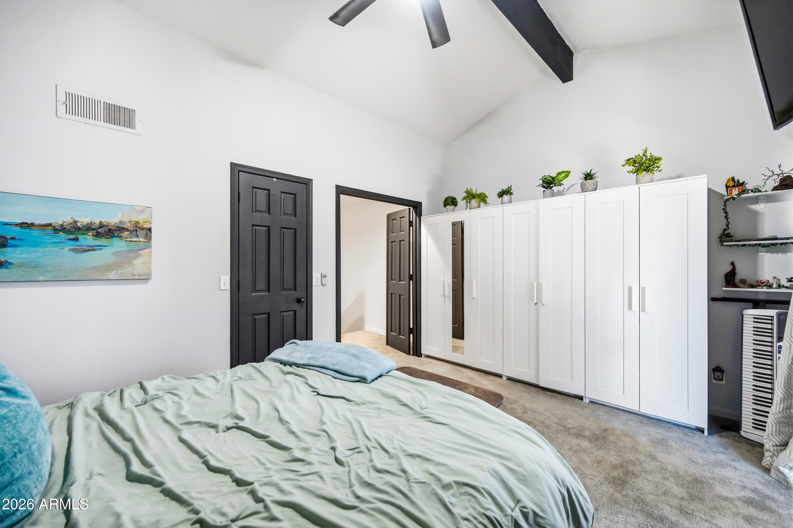 1702 East Ocotillo Road, Unit 1 Phoenix, AZ 85016 - Photo 18 of 27 a bedroom with a bed and a window