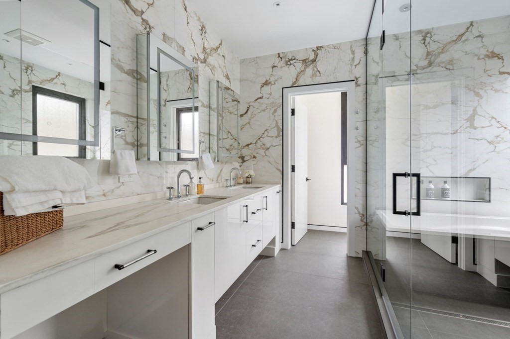41 Stearns Road, Unit SF Brookline, MA 02446 - Photo 12 of 26 a spacious bathroom with double vanity and a bathtub