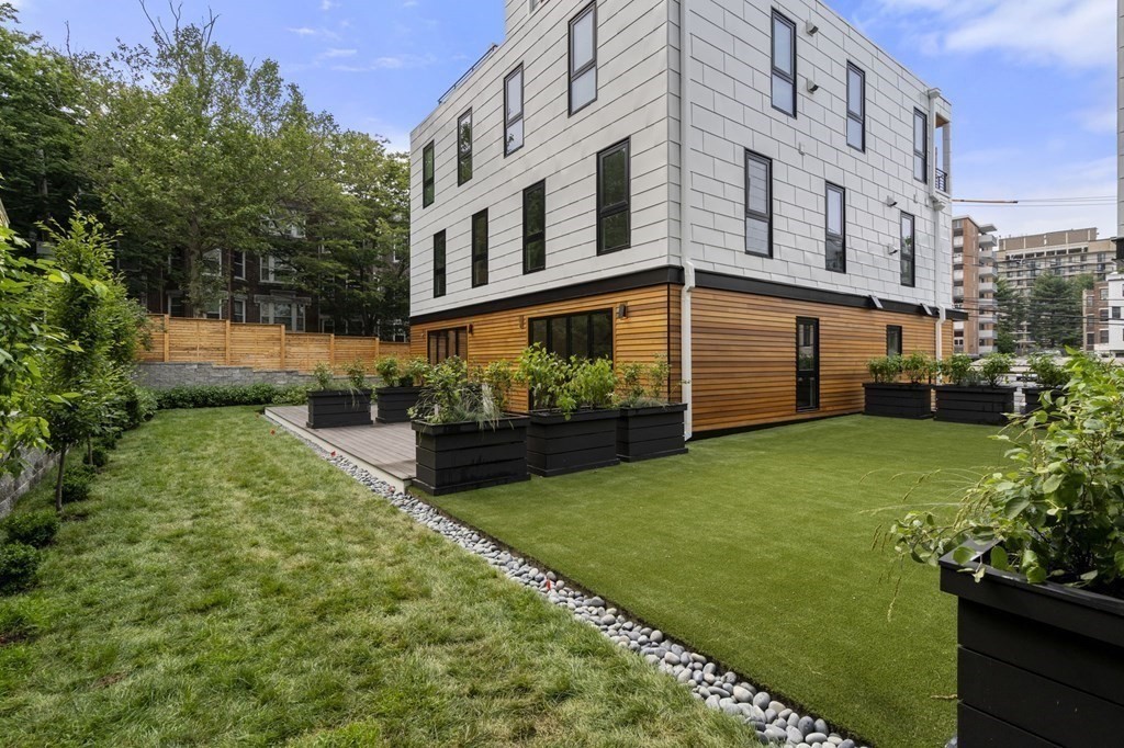 41 Stearns Road, Unit SF Brookline, MA 02446 - Photo 24 of 26 a view of a back yard of the house