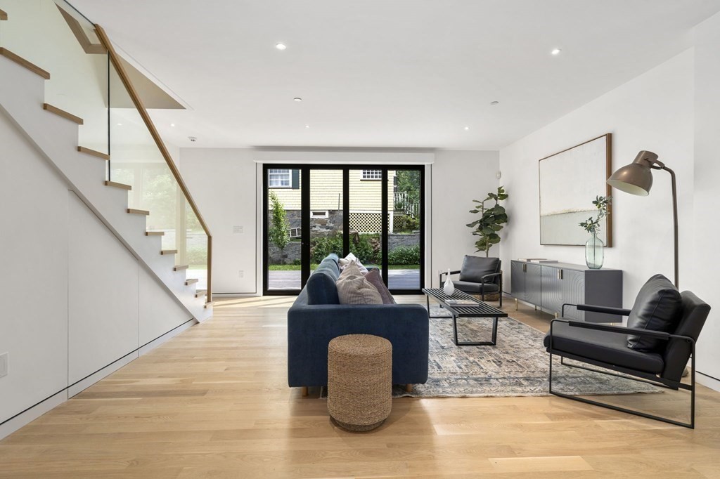 41 Stearns Road, Unit SF Brookline, MA 02446 - Photo 6 of 26 a living room with furniture and a large window