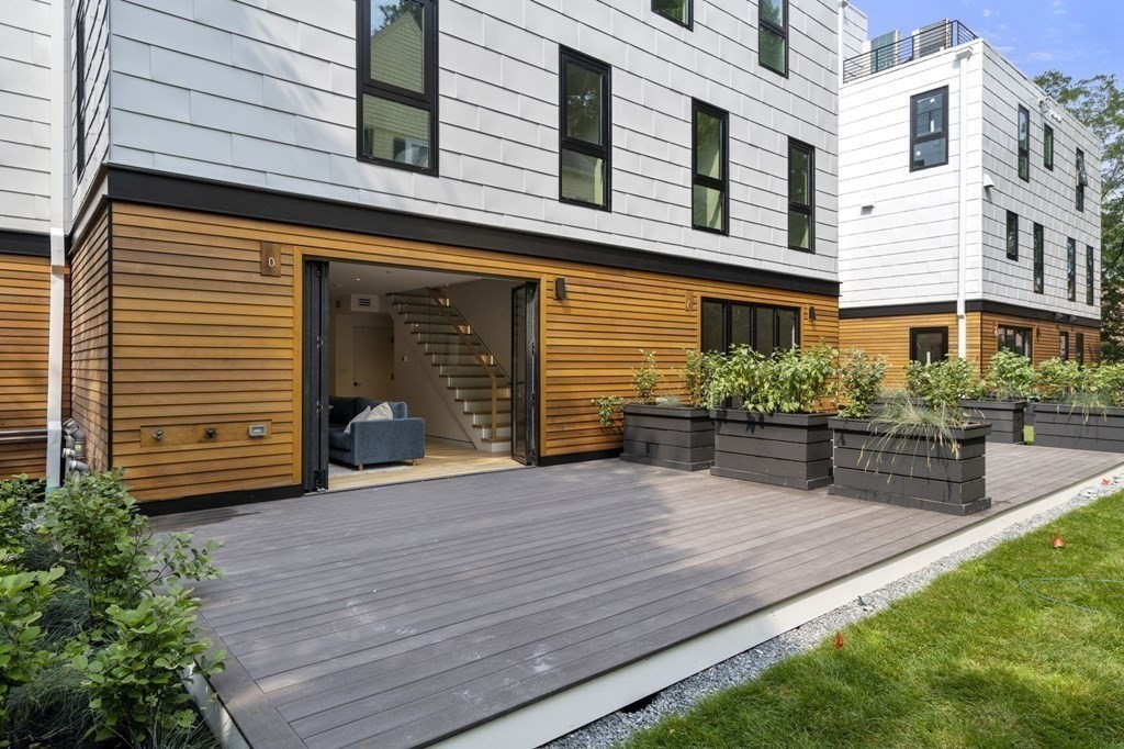 41 Stearns Road, Unit SF Brookline, MA 02446 - Photo 7 of 26 a view of a house with patio