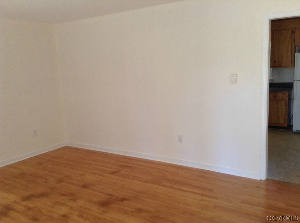 9513 Beach Road Chesterfield, VA 23838 - Photo 2 of 14 a view of empty room with wooden floor
