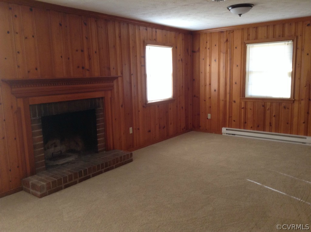 9513 Beach Road Chesterfield, VA 23838 - Photo 3 of 14 a view of an empty room with a fireplace and a window