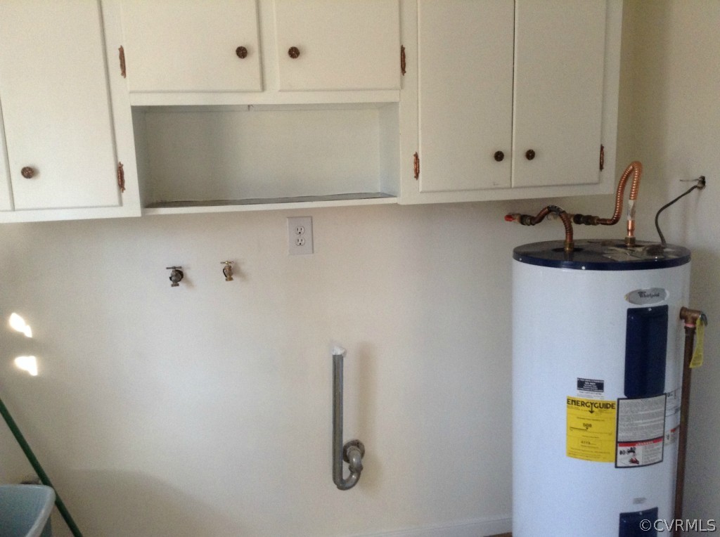 9513 Beach Road Chesterfield, VA 23838 - Photo 7 of 14 a view of storage and utility room with a washer and dryer