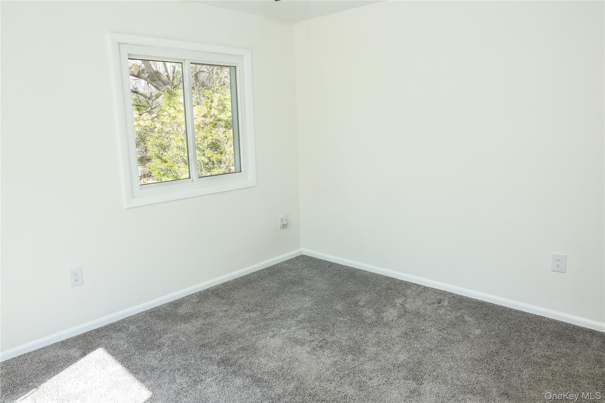 3675 Old Yorktown Road, Unit 13 Shrub Oak, NY 10588 - Photo 21 of 26 an empty room with a window