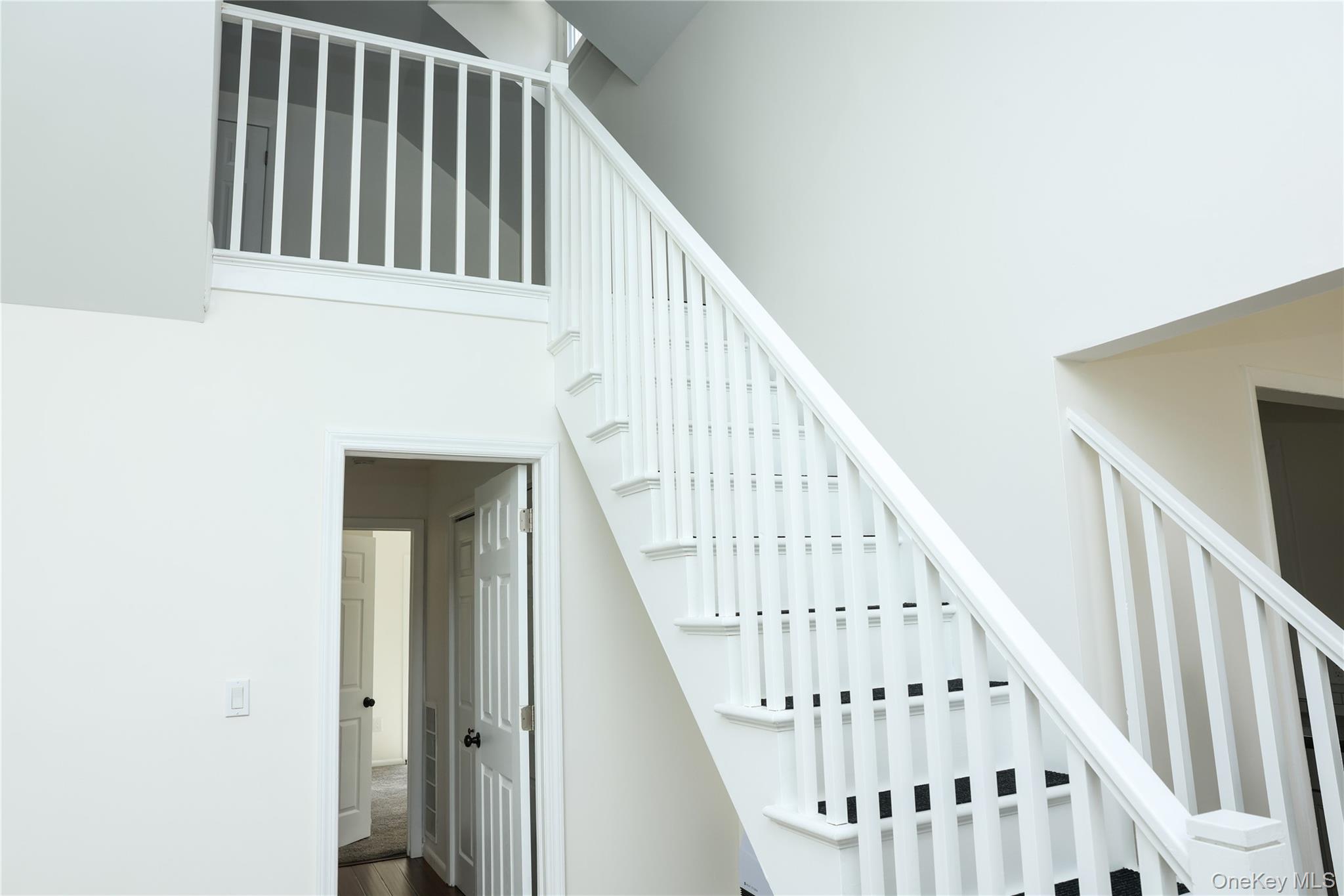 3675 Old Yorktown Road, Unit 13 Shrub Oak, NY 10588 - Photo 5 of 26 a view of staircase with railing and white walls