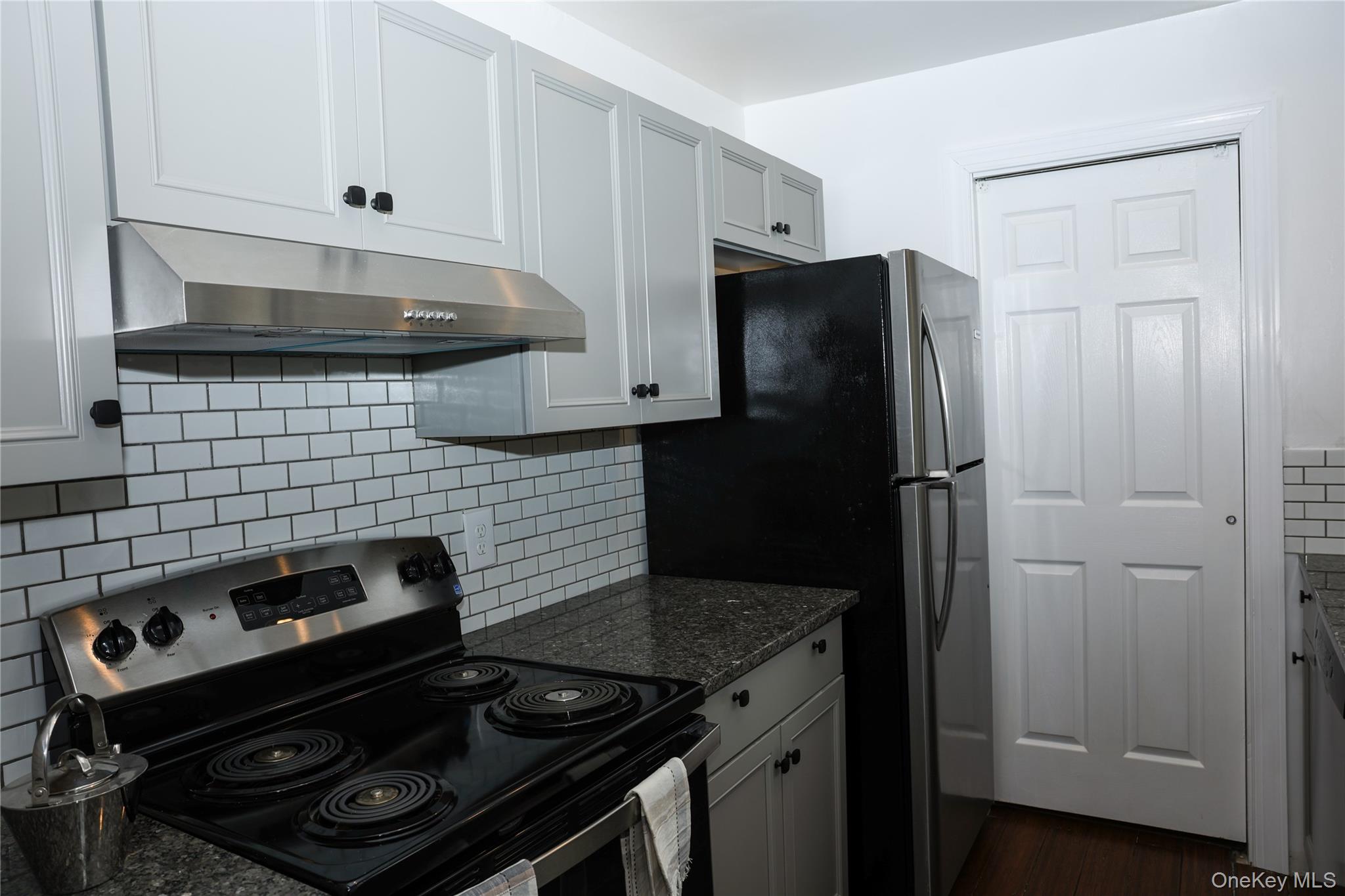 3675 Old Yorktown Road, Unit 13 Shrub Oak, NY 10588 - Photo 9 of 26 a kitchen with a stove and a refrigerator