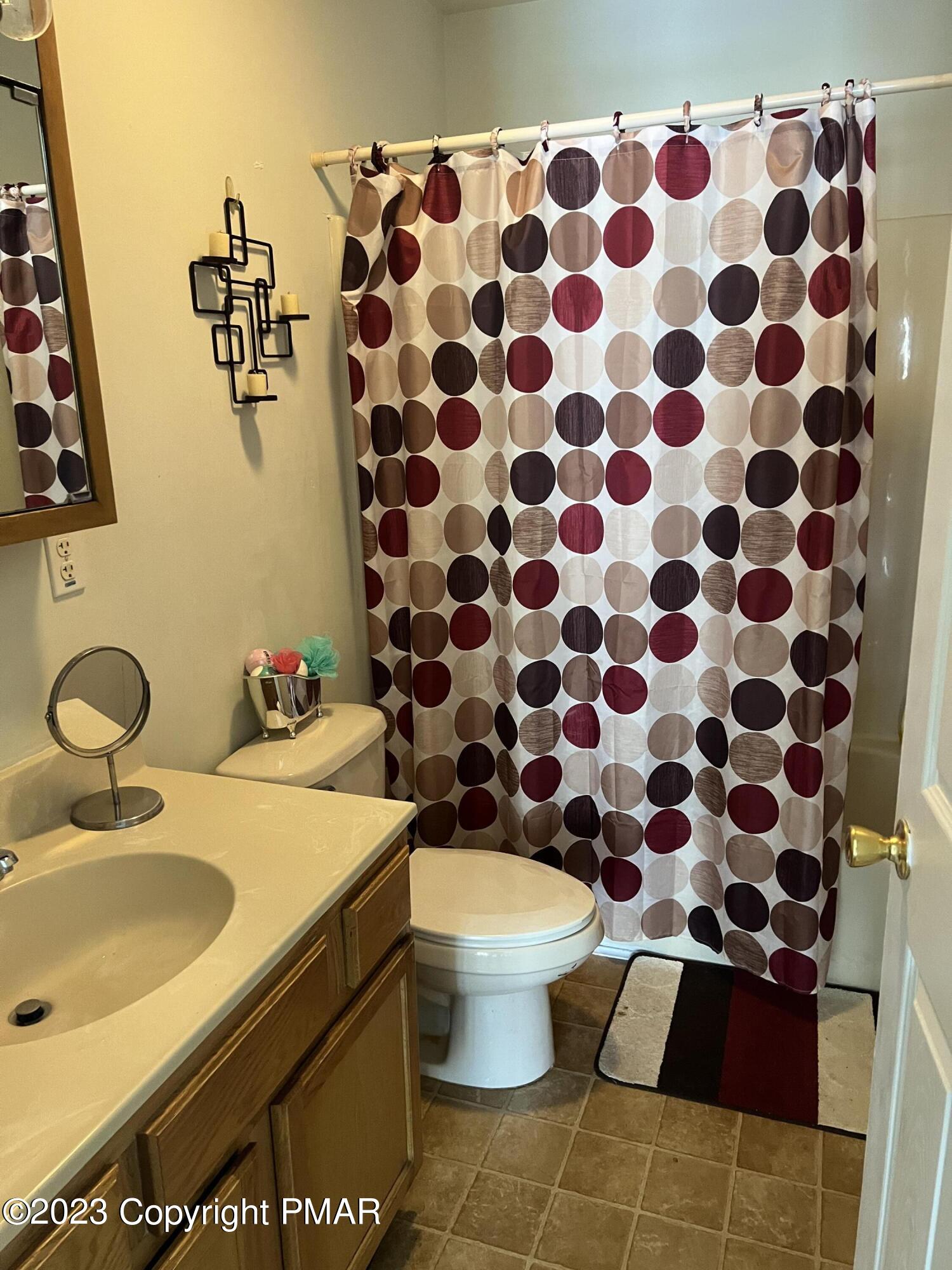 310 Coach Road Tobyhanna, PA 18466 - Photo 11 of 41 a bathroom with a sink toilet and shower