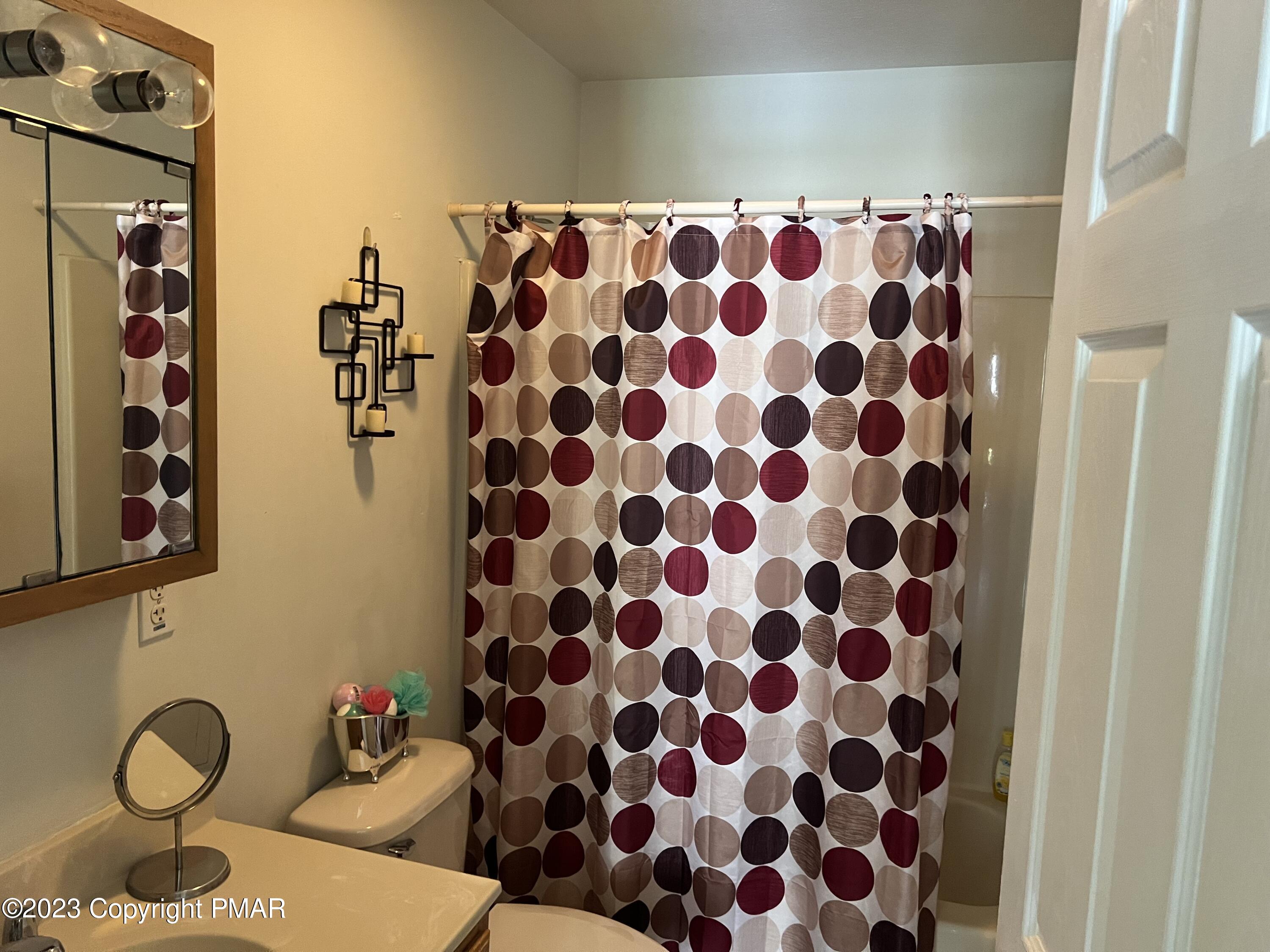 310 Coach Road Tobyhanna, PA 18466 - Photo 12 of 41 a bathroom with a granite countertop sink and a mirror
