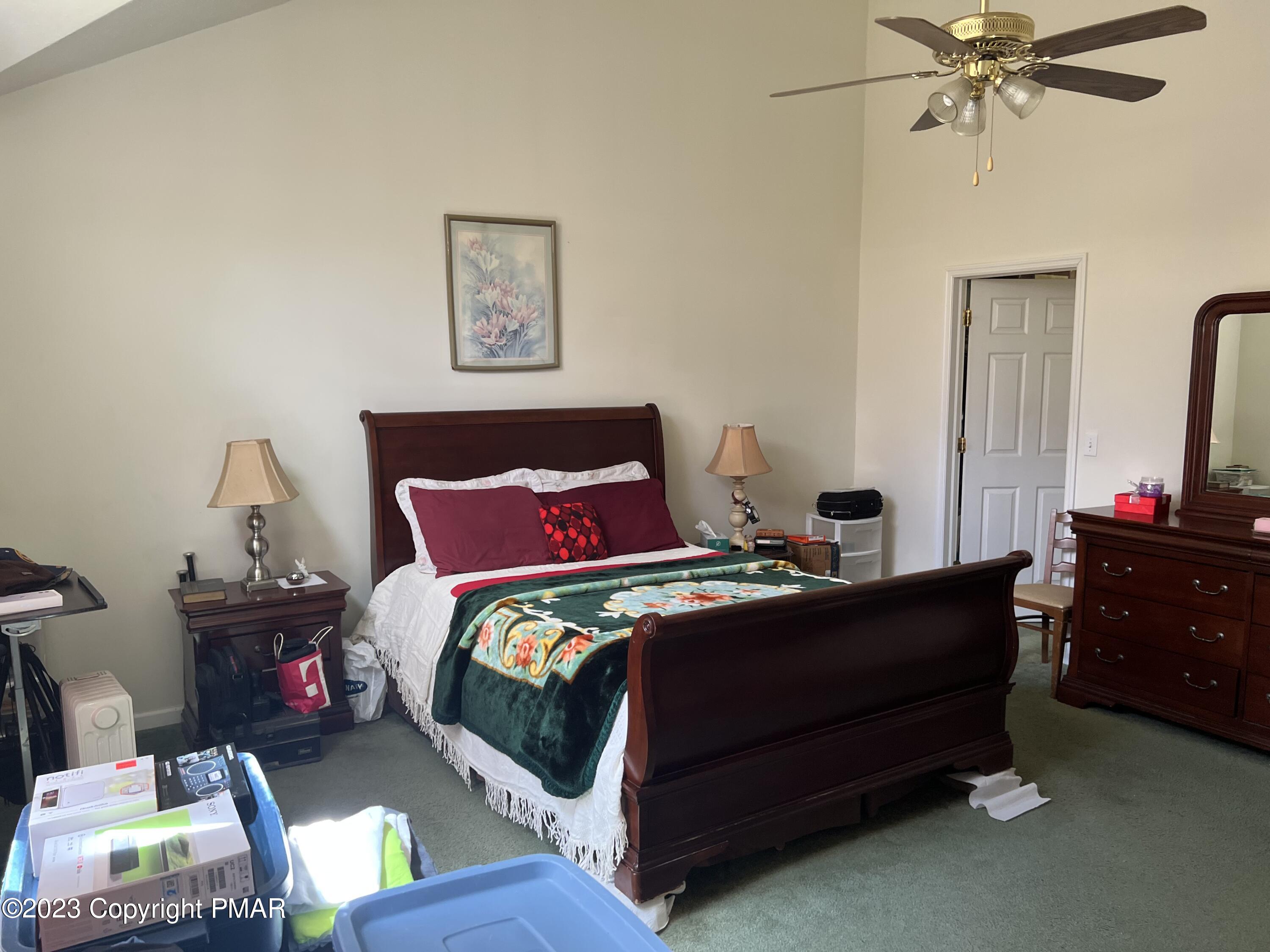 310 Coach Road Tobyhanna, PA 18466 - Photo 26 of 41 a bed room with a bed and a television