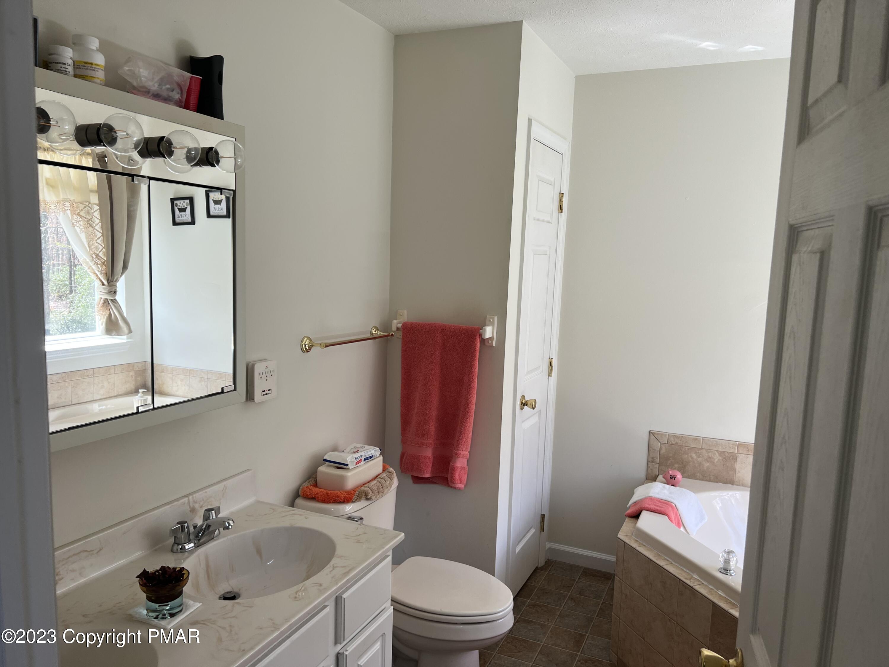 310 Coach Road Tobyhanna, PA 18466 - Photo 29 of 41 a bathroom with a sink toilet and shower