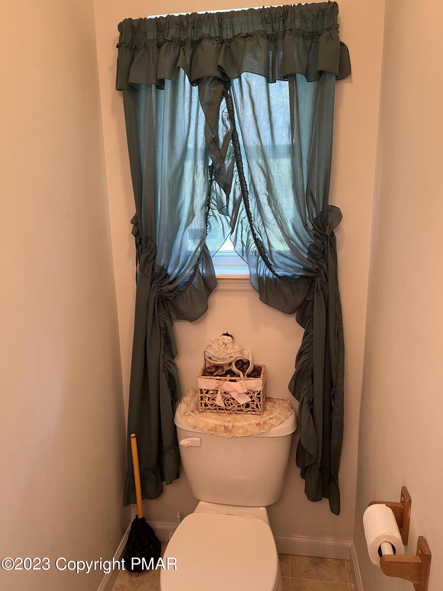 310 Coach Road Tobyhanna, PA 18466 - Photo 41 of 41 a bathroom with a toilet and a mirror