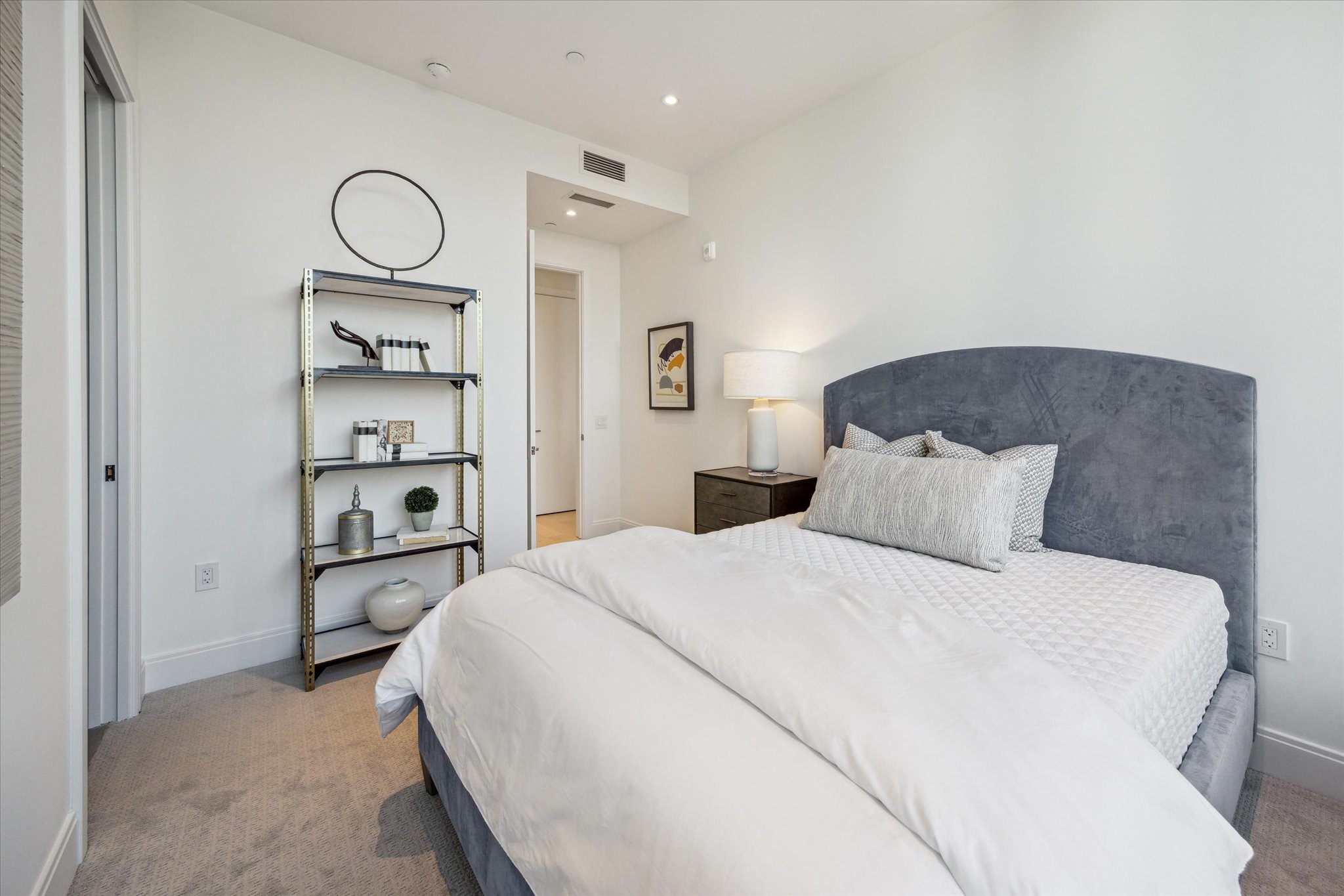 2323 West Main Street, Unit 402 Houston, TX 77098 - Photo 18 of 30 En-suite secondary bedroom with walk-in closet.