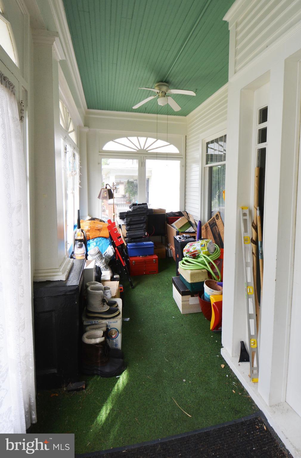 16 New Windsor Road Westminster, MD 21157 - Photo 31 of 81 Enclosed sun porch being used Apt A for storage.