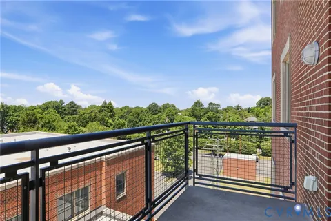 a view of city from a balcony
