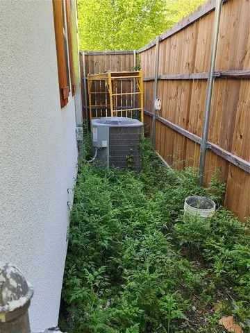 a view of a backyard with plants