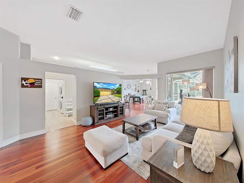 9630 Fox Hearst Road Tampa, FL 33647 - Photo 14 of 47 a living room with furniture and a flat screen tv