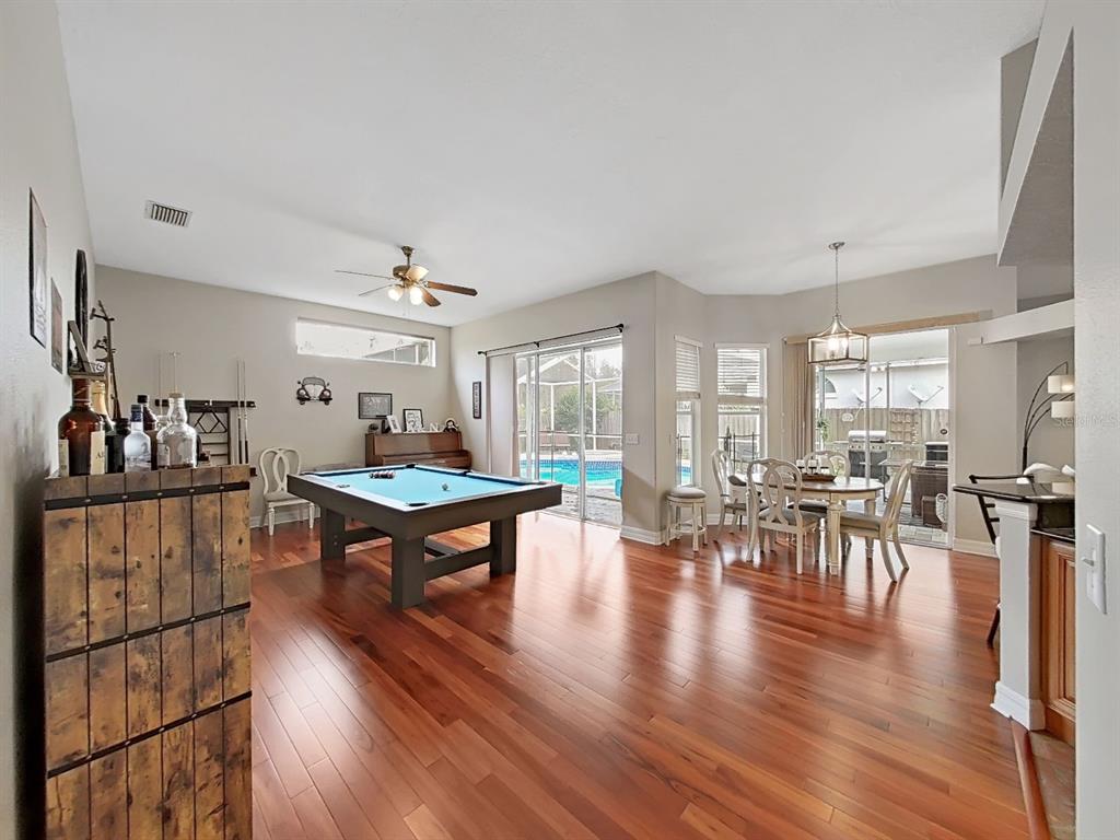 9630 Fox Hearst Road Tampa, FL 33647 - Photo 21 of 47 a living room with furniture a window and a table